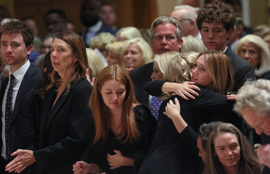 Members of the Kennedy family embrace during a memorial service for Ethel Kennedy Oct. 16, 2024, at the Cathedral of St. Matthew the Apostle in Washington. Ethel, the widow of the late Sen. Robert F. Kennedy, a mother of 11 and a human rights activist, died at age 96 Oct. 10. A private funeral Mass was celebrated for her at Our Lady of Victory Church in Centerville, Mass., Oct. 14. (OSV News photo/Leah Millis, Reuters).