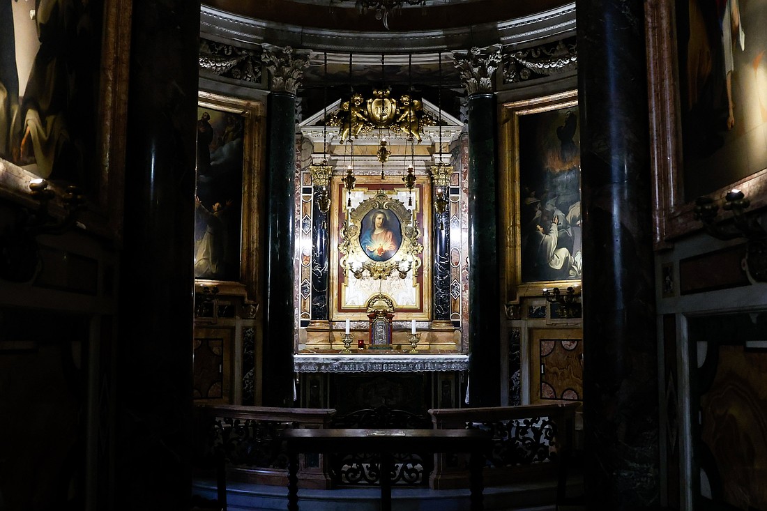 A painting by Pompeo Batoni of the Sacred Heart of Jesus from 1767 is displayed in an ornate frame inside the Jesuit Church of the Gesù in Rome, Oct. 22, 2024. (CNS photo/Lola Gomez)