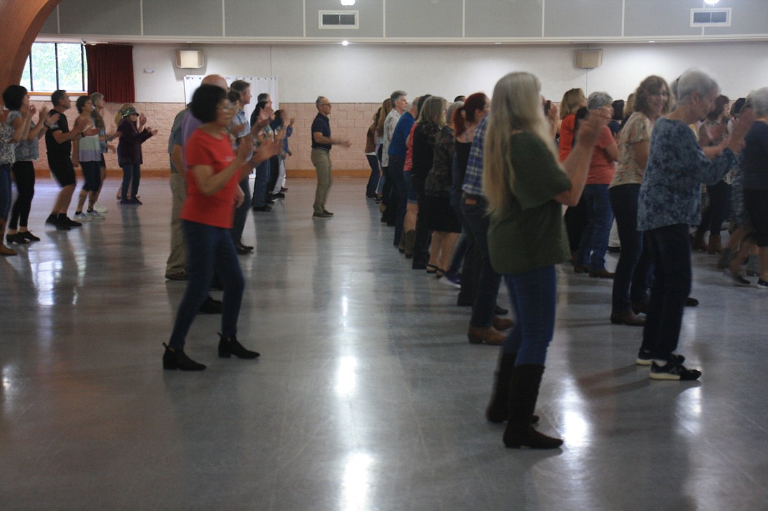 Dancers take to the floor in the parish hall of St. Maximilian Kolbe Parish, Toms River, to raise funds for Catholic Relief Services.