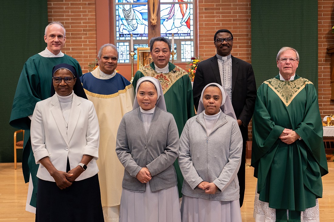 Father Alindogan, back row center, is pictured with the clergy from St. Benedict Parish and missionary priests and sisters who attended the Mass. Among the missionaries is Father Daison Areepparampil, back row, second from left, who is parochial vicar of St. James Parish, Red Bank. Matt Marzorati photos