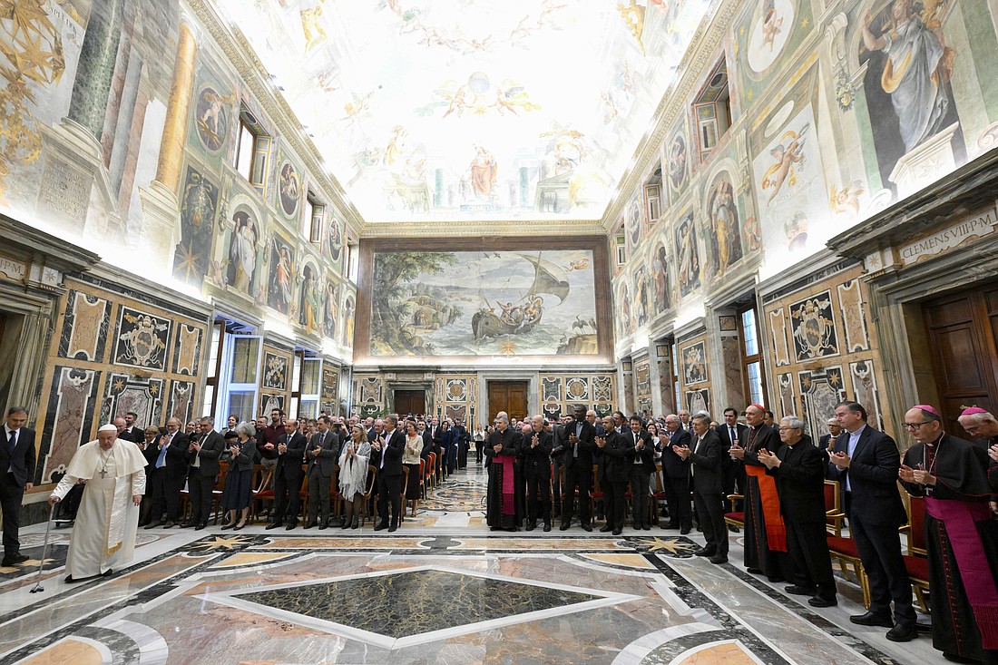 Pope Francis arrives for a meeting with members and staff of the Dicastery for Communication in the Vatican's Clementine Hall Oct. 31, 2024. (CNS photo/Vatican Media)