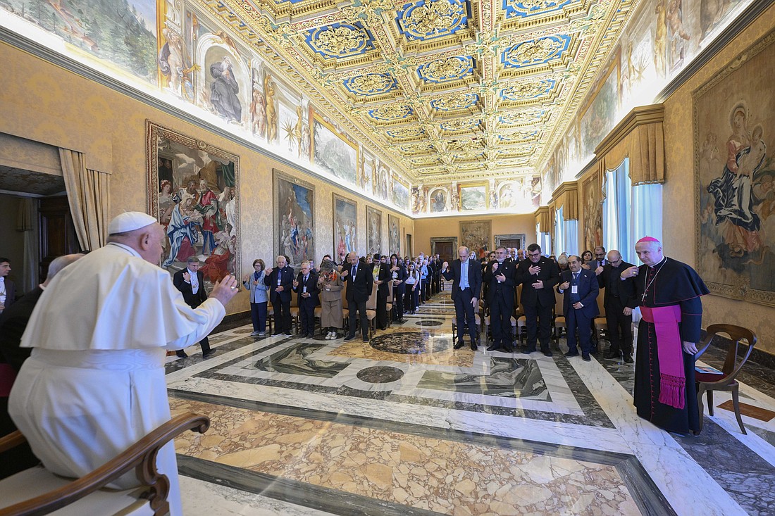 Pope Francis gives his blessing to the educational engagement branch of the Italian lay Catholic Action movement during an audience at the Vatican Oct. 31, 2024. (CNS photo/Vatican Media)