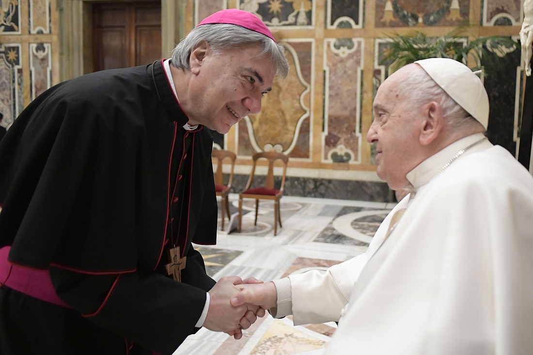 Pope Francis greets Archbishop Domenico Battaglia of Naples during an audience with seminarians and staff from the Cardinal Ascalesi Seminary in Naples, Italy, in the Vatican's Apostolic Palace Feb. 16, 2024. (CNS photo/Vatican Media)