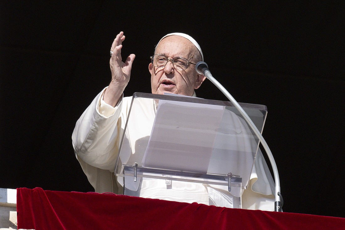 Pope Francis gives his blessing to visitors in St. Peter's Square after praying the Angelus at the Vatican Nov. 3, 2024. (CNS photo/Vatican Media)