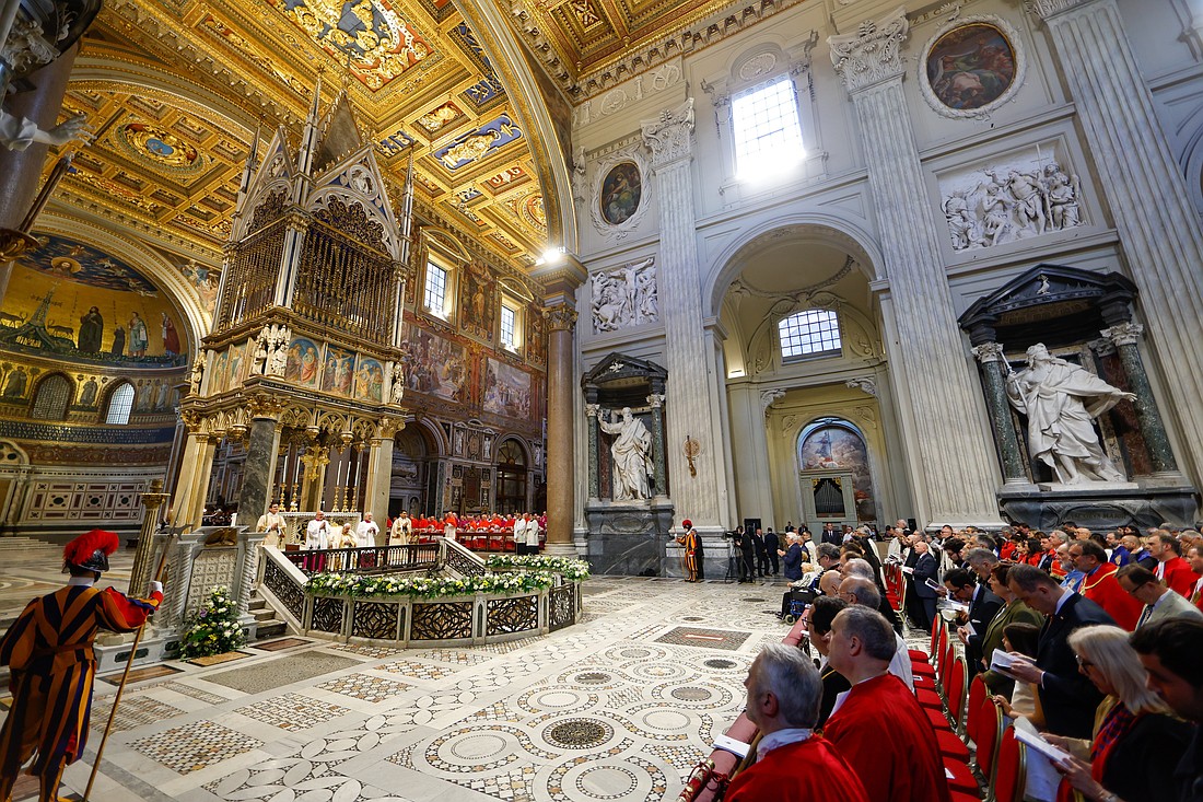 Members of confraternities and sodalities, wearing their capes, join Pope Francis for Mass on the feast of the Body and Blood of Christ in Rome's Basilica of St. John Lateran June 2, 2024. Nov. 9 marks the 1,700th anniversary of the Dedication of the Archbasilica of St. John Lateran, the cathedral of Rome and the "Mother and Head of all the Churches in the City and the World."(CNS photo/Lola Gomez)