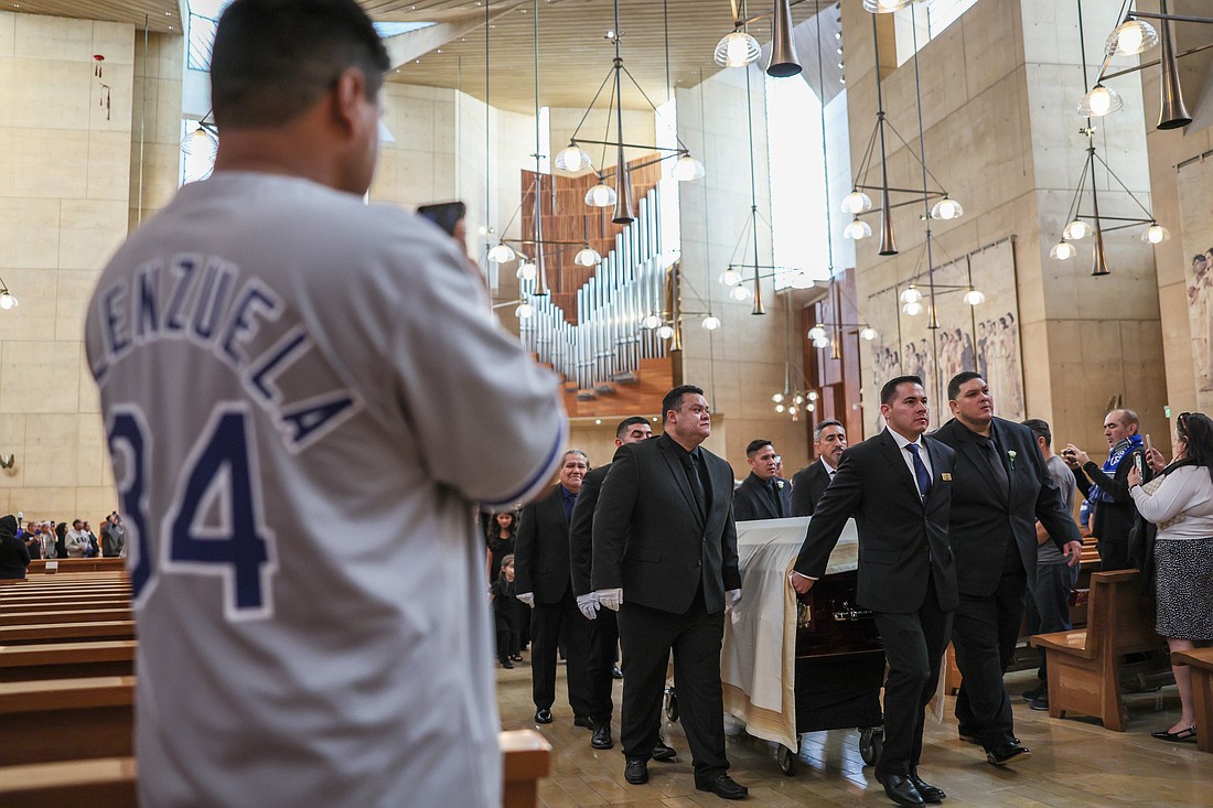 Pallbearers walk with the casket of Los Angeles Dodgers legend Fernando Valenzuela during his funeral Mass at the Cathedral of Our Lady of the Angels in Los Angeles Nov. 6, 2024. (OSV News photo/Robert Gauthier, pool via Los Angeles Times)