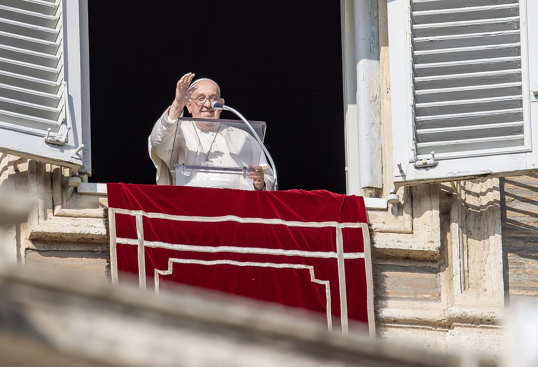 Pope Francis gives his blessing to visitors in St. Peter's Square gathered to pray the Angelus at the Vatican Nov. 10, 2024. (CNS photo/Pablo Esparza)