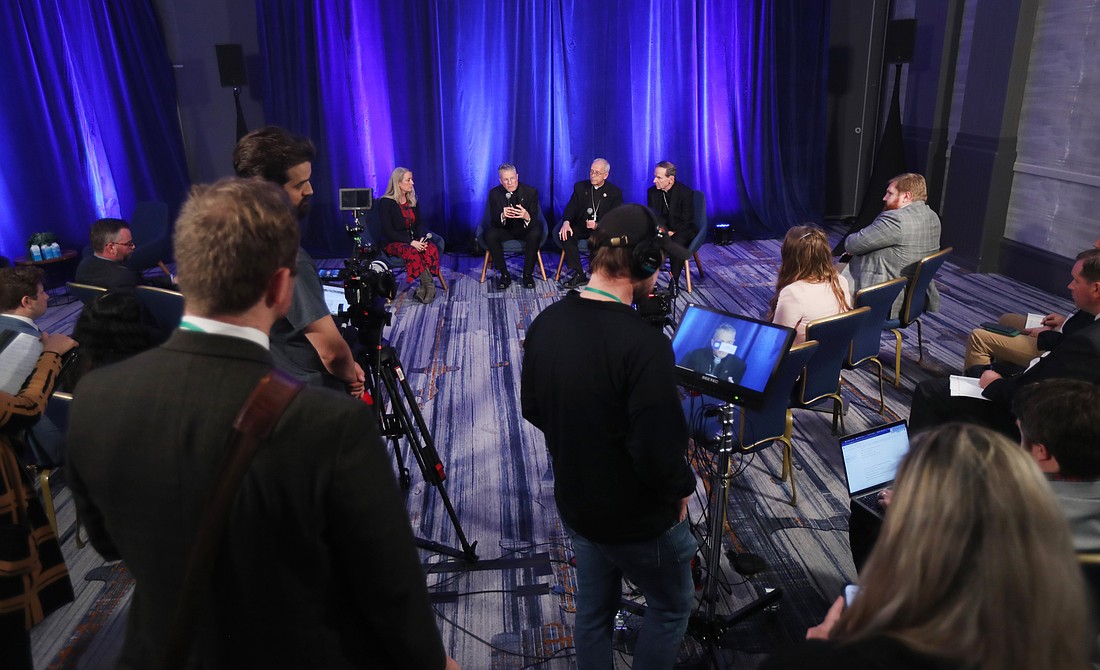 Archbishop Timothy P. Broglio of the U.S. Archdiocese for the Military Services, president of the U.S. Conference of Catholic Bishops, answers a question during a news conference Nov. 12, 2024, at a session of the fall general assembly of the USCCB in Baltimore. Also pictured are Bishops Mark J. Seitz of El Paso, Texas, and Michael F. Burbidge of Arlington, Va. (OSV News photo/Bob Roller)