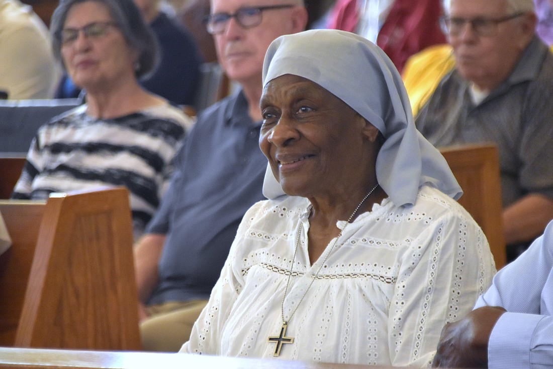 Sister Demetria Smith smiles during a Mass on Aug. 17, 2024, in the St. Augustine Home for the Aged chapel in Indianapolis honoring her 70th jubilee as a member of the Missionary Sisters of Our Lady of Africa. (OSV News photo/Natalie Hoefer, The Criterion)