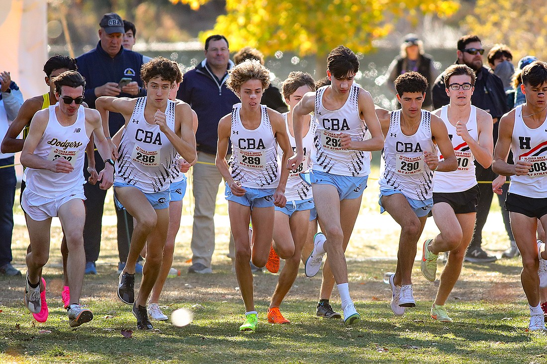 The CBA cross country runners get off the starting line and embark on a history-making effort at the Nov. 16 Meet of Champions.  Photo by Larry Levanti / https://larrylevanti.com/