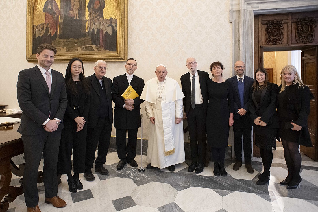 Pope Francis stands for a photo with winners of the 2024 Ratzinger prize and others during a meeting at the Vatican Nov. 22, 2024. To the right of the pope is Cyril O'Regan, a professor at the University of Notre Dame and prize winner. Third from left is Jesuit Father Federico Lombardi, president of the board of directors of the Joseph Ratzinger-Benedict XVI Vatican Foundation, and fourth from left is Etsuroo Sotoo, a Japanese sculptor and prize winner. (CNS photo/Vatican Media)