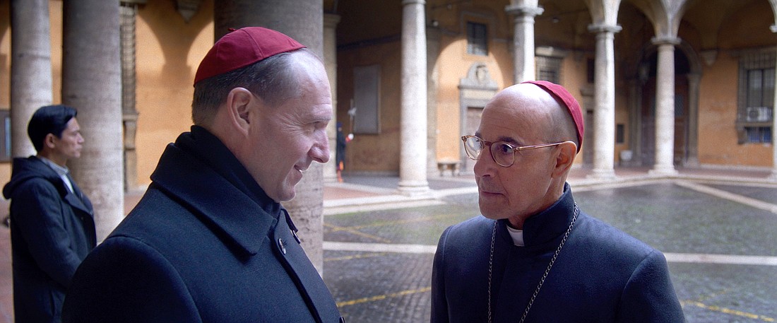 Ralph Fiennes as Cardinal Lawrence and Stanley Tucci as Cardinal Bellini star in a scene from the movie "Conclave." Four weeks into its theater run, "Conclave" has has an exceptional box-office showing and has been floated as an Academy Award nominee. (OSV News photo/Focus Features)