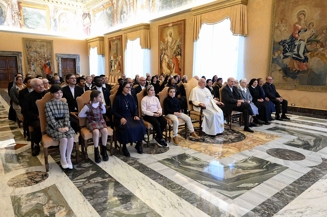 Pope Francis poses for a photo with members of religious orders belonging to the Calasanzian Family during a meeting at the Vatican Nov. 28, 2024. (CNS photo/Vatican Media)