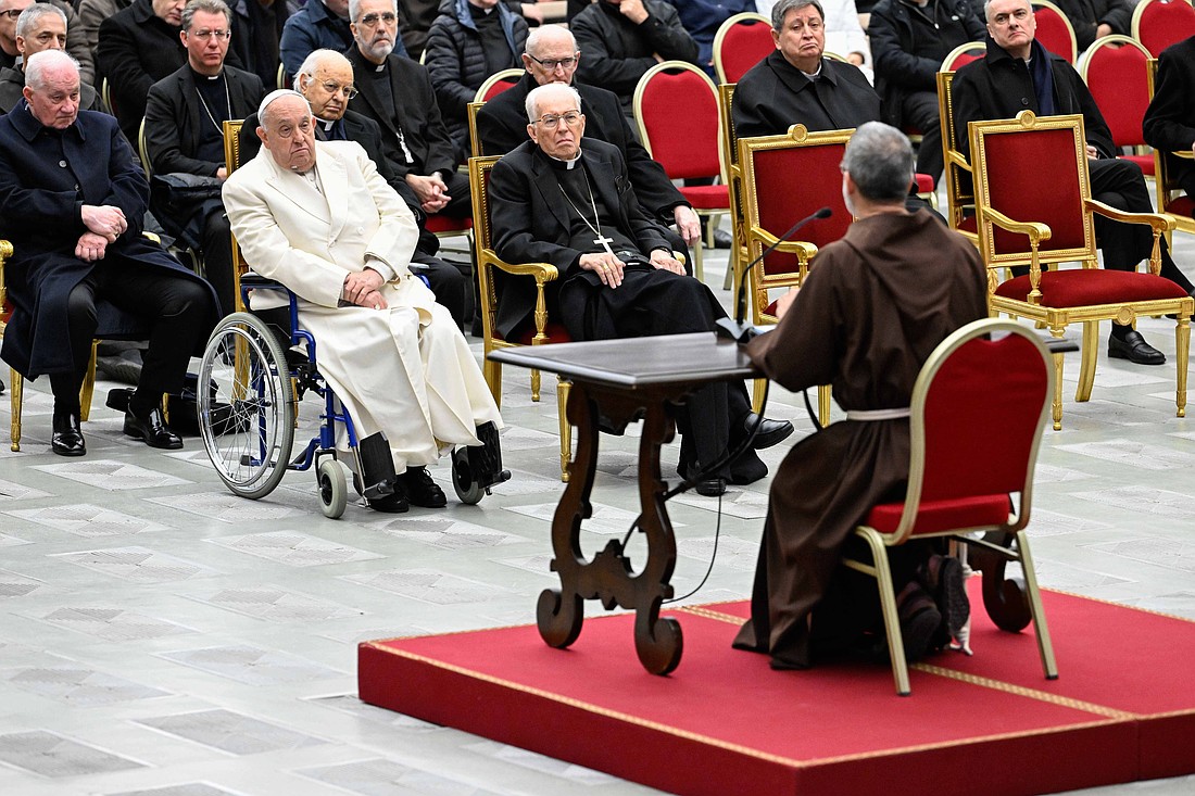 Pope Francis and members of the Roman Curia attend an Advent reflection led by Capuchin Father Roberto Pasolini, the new preacher of the papal household, in the Paul VI Audience Hall at the Vatican, Dec. 6, 2024. (CNS photo/Vatican Media)
