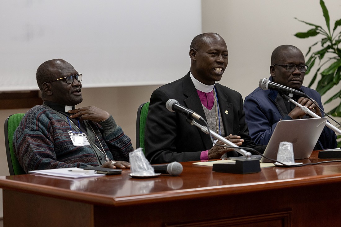 Anglican Archbishop Samuel Peni of Western Equatoria, South Sudan, Catholic Bishop Alex Sakor Eyobo of Yei, South Sudan, and Catholic Bishop Yunan Tombe Trille Kuku Andali of El Obeid, Sudan address the "Growing Together" summit sponsored by the International Anglican-Roman Catholic Commission on Unity and Mission Jan. 24, 2024, in Rome. Bishop Andali said Dec. 2 that he narrowly escaped execution in his country some days prior when he fell into the hands of the paramilitary Rapid Support Forces, engaged in a deadly war with the Sudan Armed Forces. (CNS photo/Neil Turner, IARCCUM)