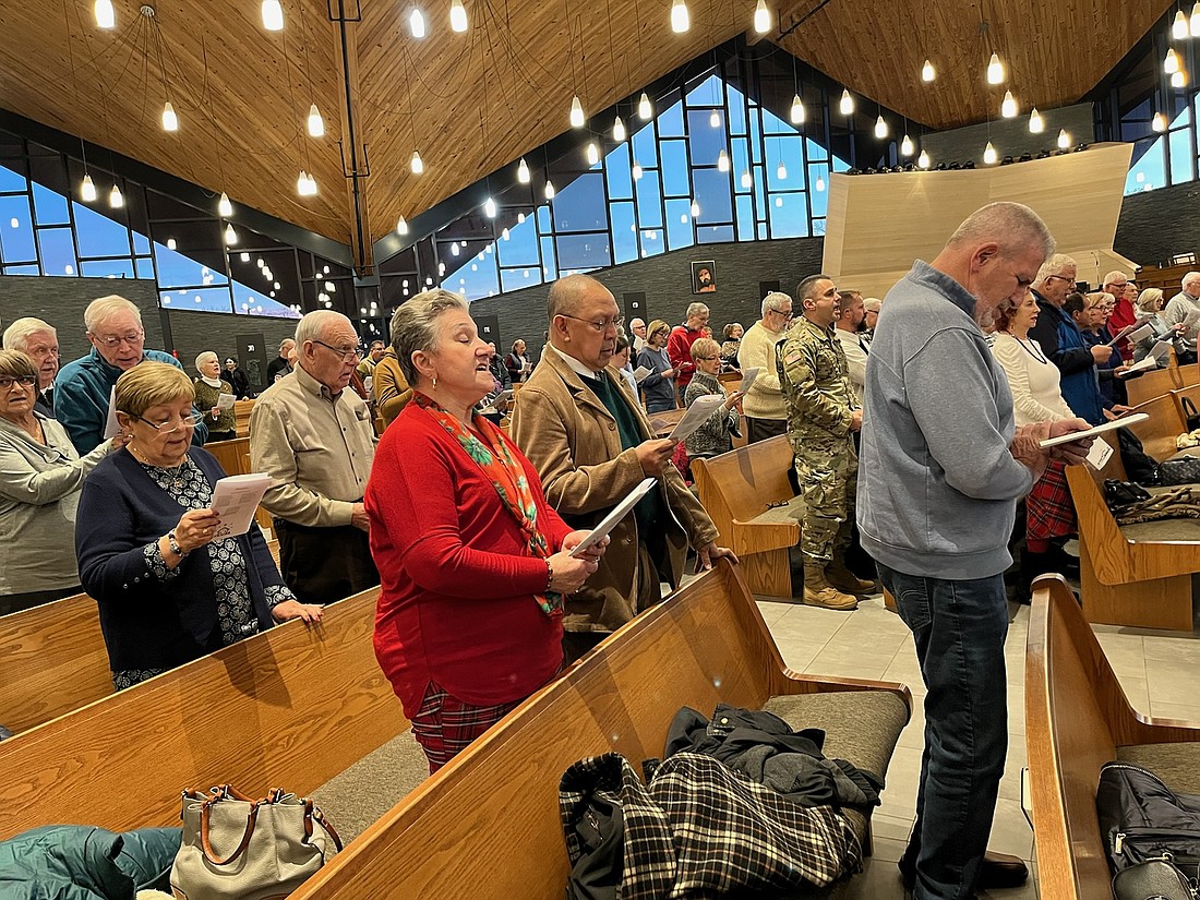 Concert attendees join in singing the Messiah.