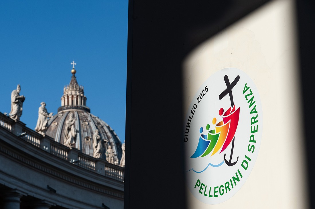 The is a combination photo of St. Peter’s Basilica and the logo chosen by the Vatican for the Holy Year 2025. Pope Francis has chosen the theme, "Pilgrims of Hope," for the jubilee year, which is marked by pilgrimages, prayer, repentance and acts of mercy.  (OSV News photo/Massimiliano Migliorato, Catholic Press Photo). ..