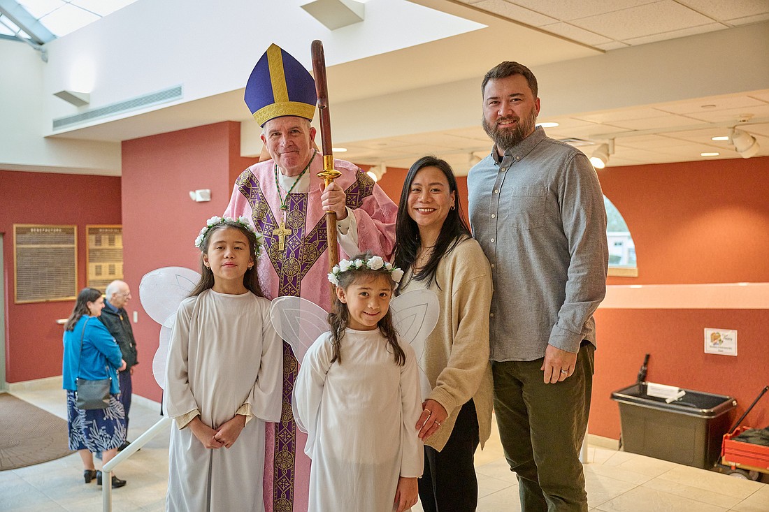 Bishop David M. O'Connell, C.M., joined the community of St. Veronica, Howell, for the 2023 Simbang Gabi observance. This year, parishes of the Diocese continue to carry on the beloved Filipino tradition. Mike Ehrmann photo