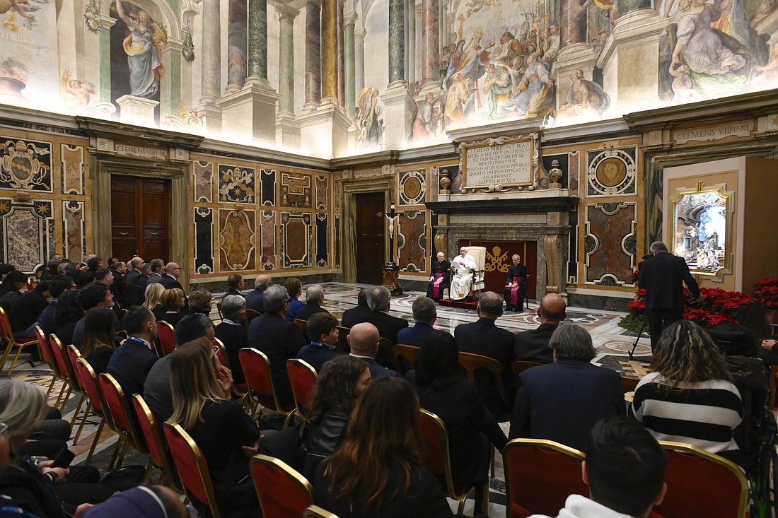 Pope Francis speaks to representatives of Italian banks and credit unions dedicated to serving the community during an audience at the Vatican Dec. 16, 2024. (CNS photo/Vatican Media).