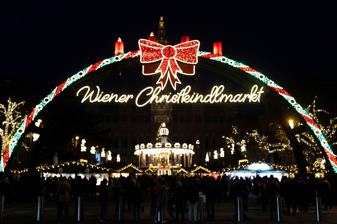 Decorations illuminate the entrance to the Viennese Christmas Market at City Hall Square in Vienna Dec. 6, 2022. (OSV News photo/Lisa Leutner, Reuters)