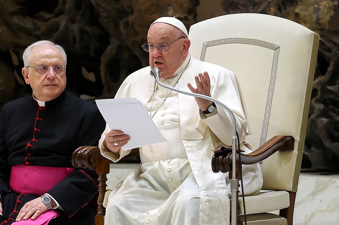 Pope Francis speaks to visitors in the Paul VI Audience Hall during his weekly general audience at the Vatican Dec. 18, 2024. (CNS photo/Lola Gomez)