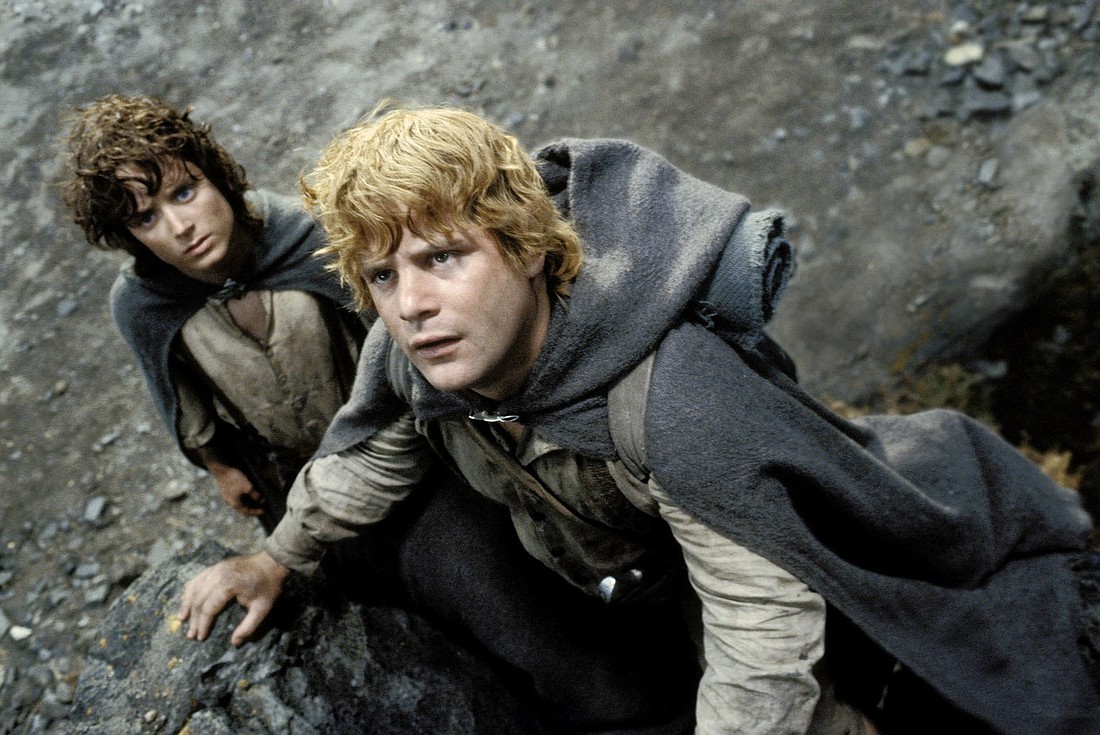 Frodo (Elijah Wood) and Sam (Sean Astin) begin their climb toward Mount Doom in a scene from "The Return of the King," the finale of the "The Lord of the Rings" movie trilogy. The OSV News classification is A-III -- adults. The Motion Picture Association of America rating is PG-13 -- parents are strongly cautioned. Some material may be inappropriate for children under 13. (OSV News photo/New Line Cinema)