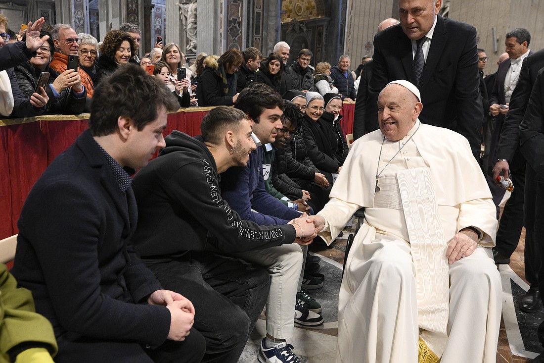 Pope Francis greets Italian pilgrims to Santiago de Compostela, Spain, during a meeting in St. Peter's Basilica at the Vatican Dec. 19, 2024. (CNS photo/Vatican Media)