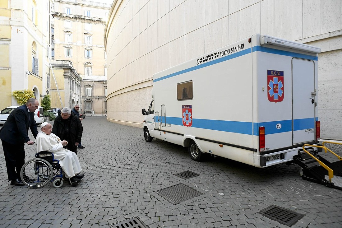 Pope Francis, accompanied by Cardinal Konrad Krajewski, prefect of the Dicastery for the Service of Charity, blesses the mobile hospital Dec. 18, 2024, at the Vatican. On the same day Cardinal Krajewski left for Ukraine, driving the mobile hospital from Rome to Lviv, Ukraine. (OSV News photo/courtesy Vatican News) Editors: best quality available.