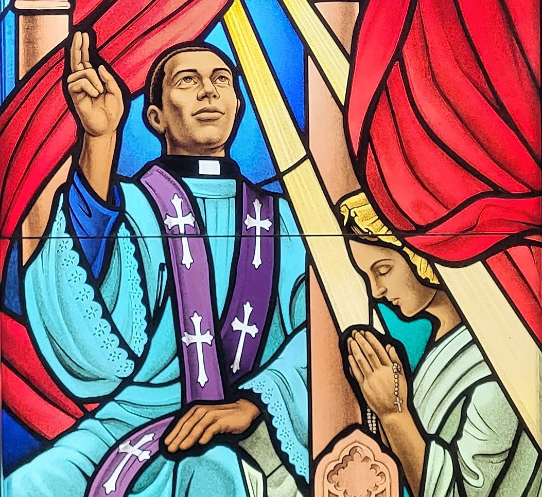 This is one of the recently installed stained-glass windows in the Cathedral of St. Joseph in Jefferson City, Mo., depicting Venerable Father Augustus Tolton carrying out his priestly ministry. (OSV News photo/Jay Nies, The Catholic Missourian)