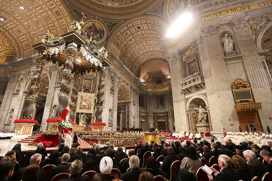 Pope Francis presides over Christmas Mass at Night in St. Peter’s Basilica at the Vatican Dec. 24, 2024, following the opening of the Holy Door. (CNS photo/Lola Gomez)