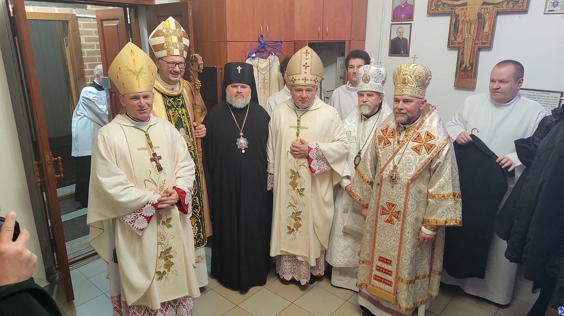 Cardinal Konrad Krajewski, center, prefect of the Dicastery for the Service of Charity, is seen Dec. 24, 2024, in Kharkiv, Ukraine, with the apostolic nuncio to Ukraine and local Greek Catholic and Ukrainian Orthodox bishops before sharing a Christmas vigil meal with local clergy and religious, all of whom were invited to be greeted by the papal envoy, (OSV News photo/courtesy Cardinal Konrad Krajewski)