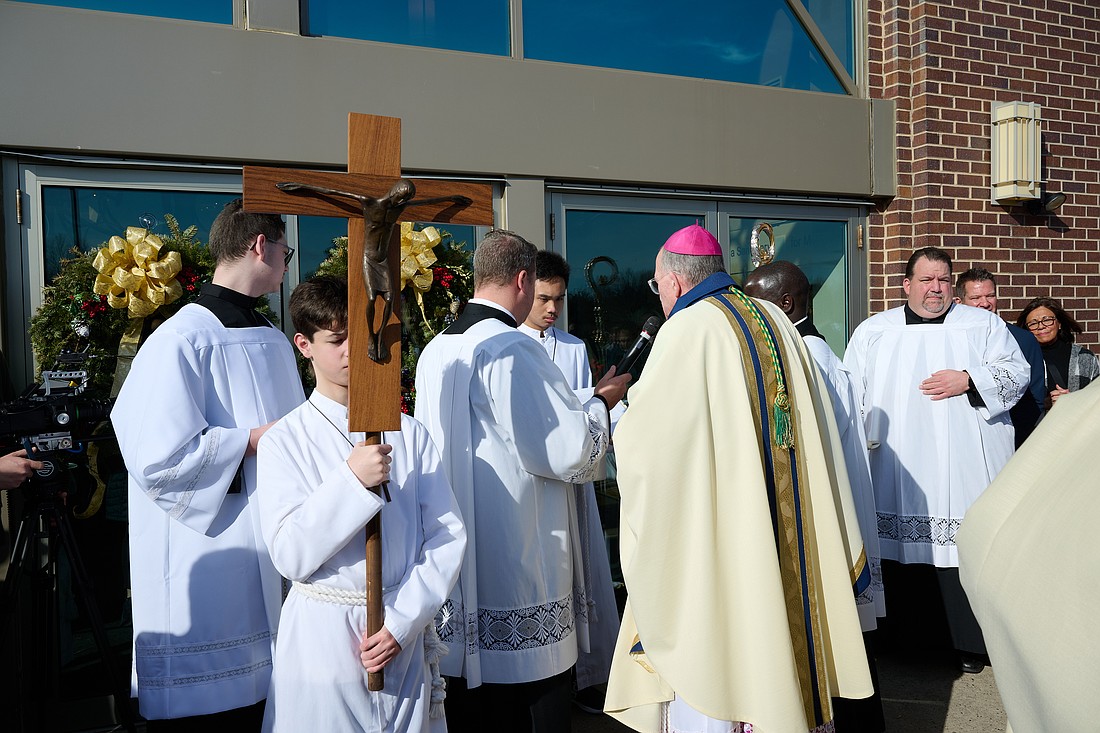 Bishop O'Connell leads a prayer marking the opening of the Jubilee Year at the start of the Mass he celebrated in St. Robert Bellarmine Co-Cathedral, Freehold, on Dec. 29. Mike Ehrmann photo