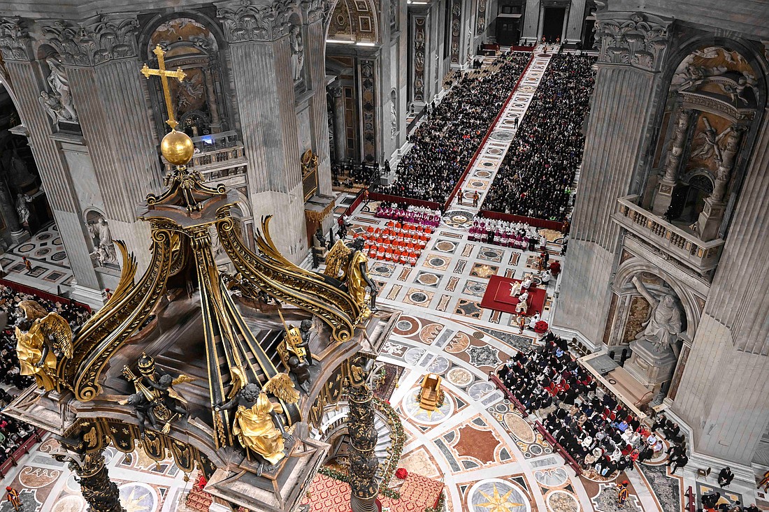 Attendees participate in an evening prayer service with Pope Francis in St. Peter's Basilica for New Year's Eve at the Vatican Dec. 31, 2024. (CNS photo/Vatican Media)