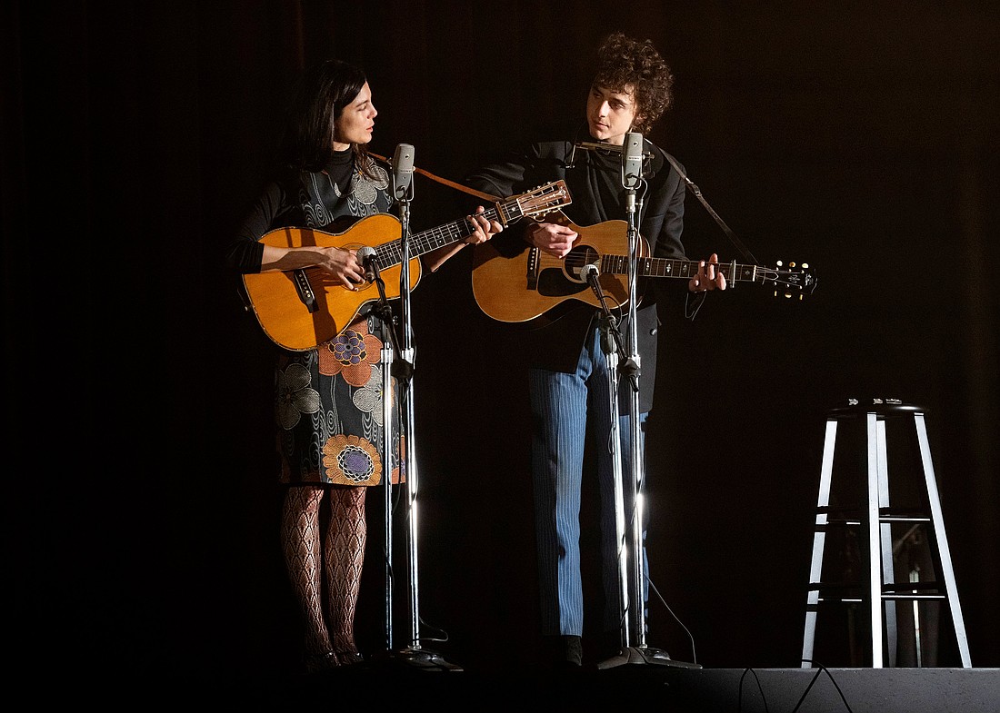 Monica Barbaro and Timothée Chalamet star in a scene from the movie "A Complete Unknown." The OSV News classification is A-III -- adults. The Motion Picture Association of America rating is R -- restricted. Under 17 requires accompanying parent or adult guardian. (OSV News photo/Macall Polay, Searchlight Pictures)