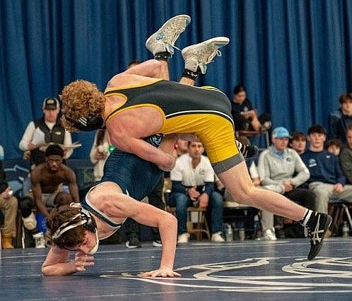 SJV 132-pounder Patrick O'Keefe, a 2024 state place finisher, takes down his opponent at CBA's recent Catholic Duals tournament. Photo courtesy of Pat Smith