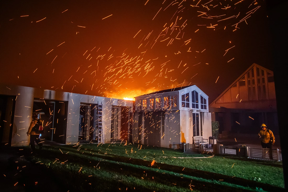 This photo from Getty Images shows firefighters battling the blaze that destroyed Corpus Christi Church in Pacific Palisades, Calif.