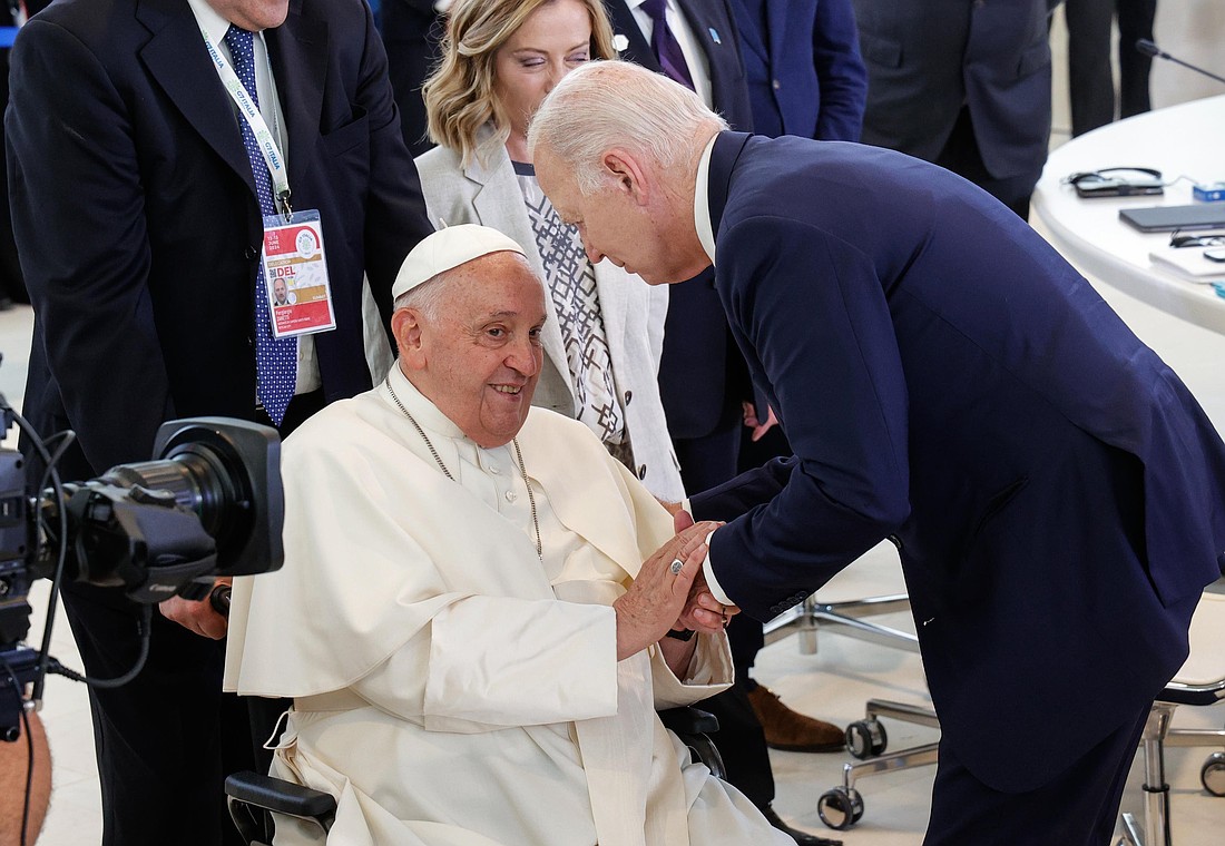 Pope Francis greets U.S. President Joe Biden June 14, 2024, before the pontiff gave a speech to world leaders at the Group of Seven summit in Borgo Egnazia in Italy's southern Puglia region. On Jan. 11, 2025, Biden spoke with the pope from the White House in Washington and named him as a recipient of the Presidential Medal of Freedom with Distinction. Biden had been scheduled to have an audience with the pope during a Jan. 9-12 trip to Rome but the president canceled the trip to amid the California wildfires. (CNS photo/courtesy of G7 Italia 2024)