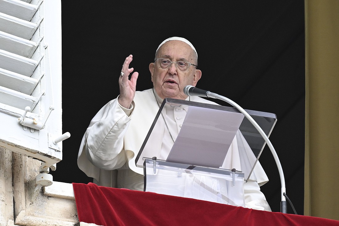 Pope Francis gives his blessing to people gathered in St. Peter's Square at the Vatican for the recitation of the Angelus prayer Jan. 12, 2025. (CNS photo/Vatican Media)