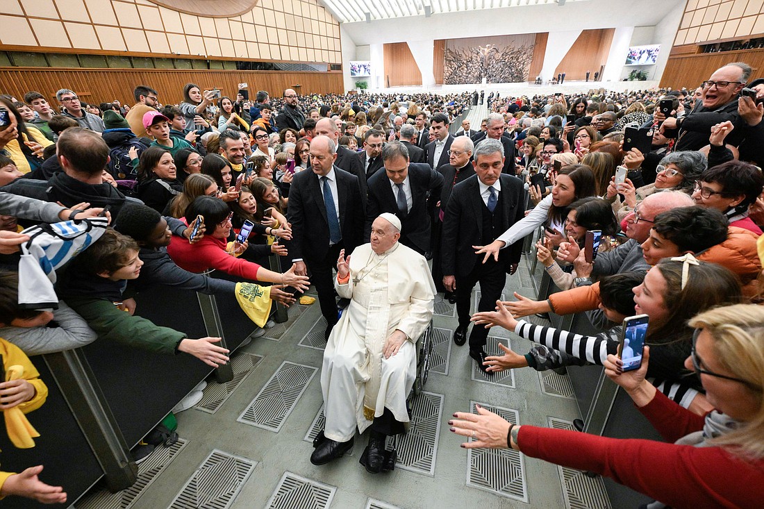 Pope Francis greets visitors at the conclusion of the first of his Saturday general audiences for the Holy Year in the Paul VI Audience Hall at the Vatican Jan. 11, 2025. (CNS photo/Vatican Media)