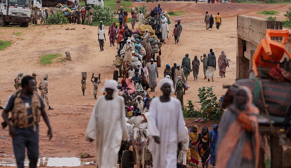 Sudanese people who fled the conflict in Murnei in Sudan's Darfur region cross the border between Sudan and Chad in Adre, Chad, Aug. 4, 2023. (OSV News/Zohra Bensemra, Reuters)