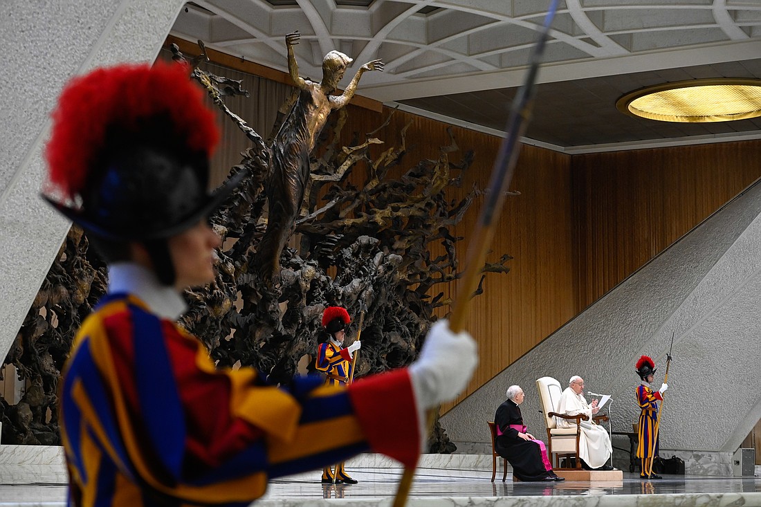 Pope Francis talks to visitors during the first of his Saturday general audiences for the Holy Year in the Paul VI Audience Hall at the Vatican Jan. 11, 2025. In his message, the pope focused on conversion and the hope that comes from being able to “start again” with God. (CNS photo/Vatican Media)