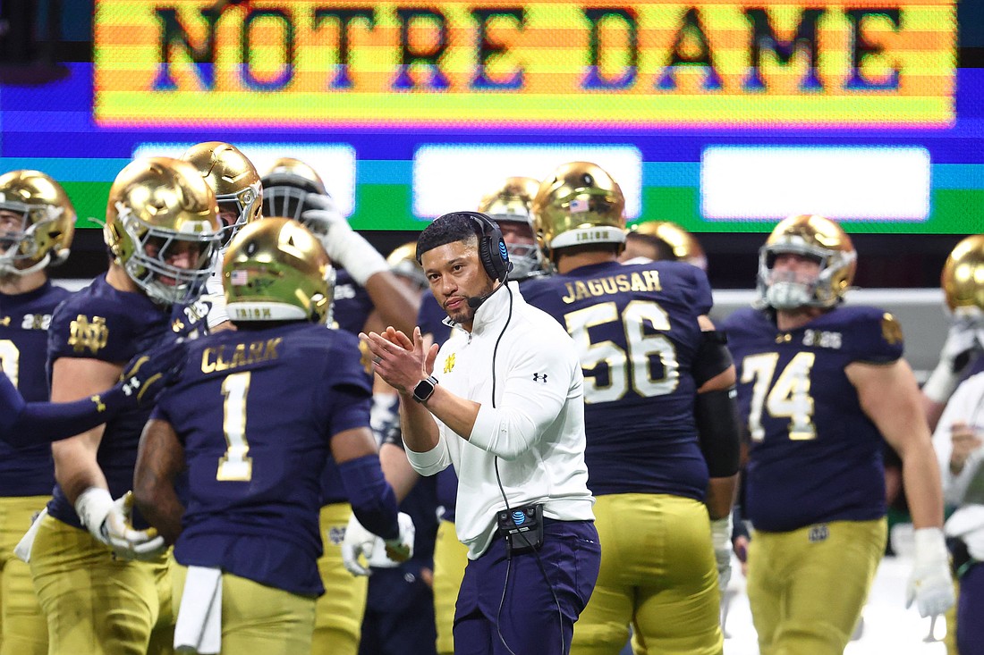 Notre Dame Fighting Irish head coach Marcus Freeman reacts after a play against the Ohio State Buckeyes during the second half the CFP National Championship college football game at Mercedes-Benz Stadium in Atlanta Jan. 20, 2025. (OSV News photo/Mark J. Rebilas-Imagn Images via Reuters) Editors: Mandatory Credit..