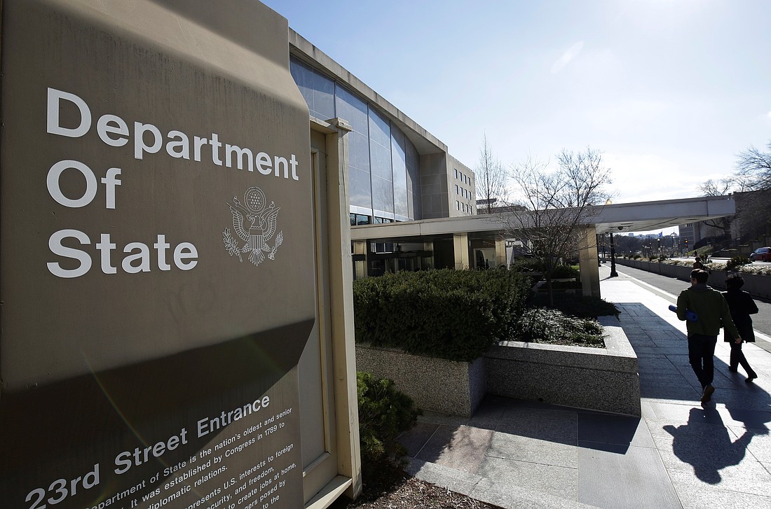 People enter the U.S. Department of State building in Washington Jan. 26, 2017. The Trump administration cancelled travel plans for refugees previously approved under the resettlement program. (OSV News photo/Joshua Roberts, Reuters)