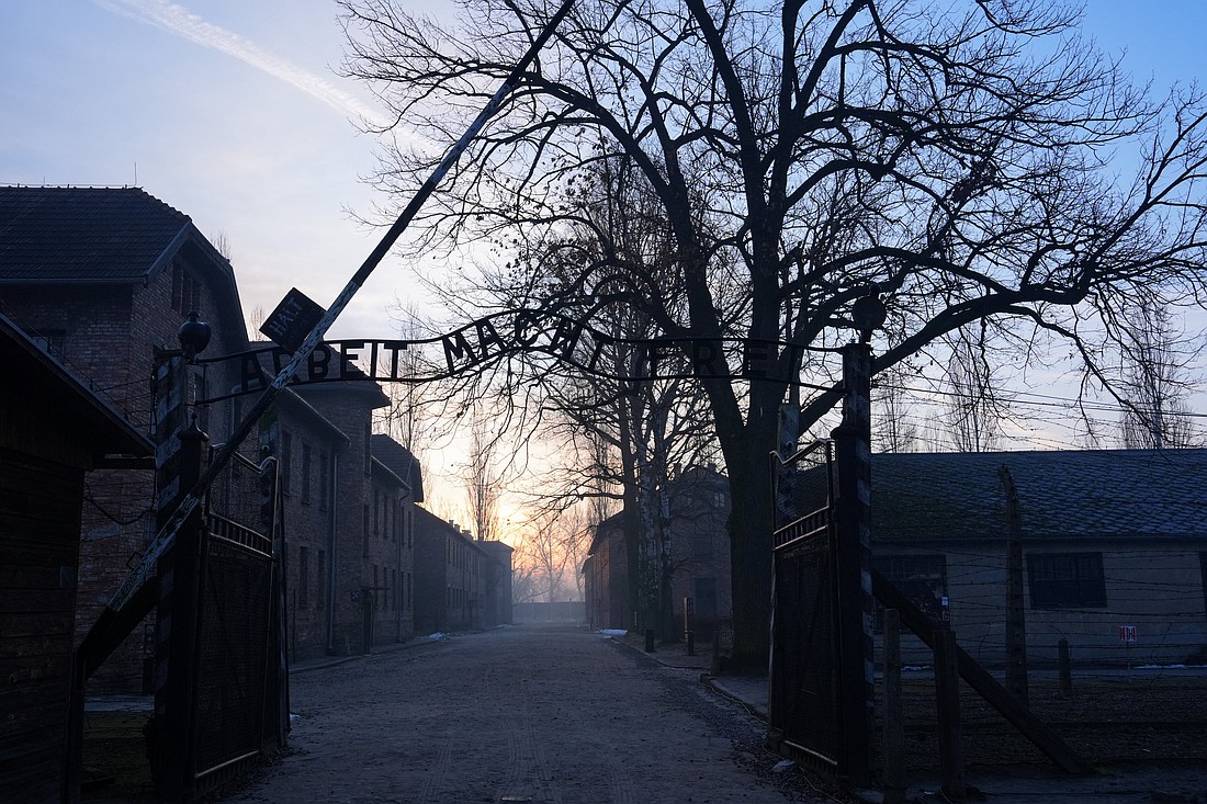 The gate that reads "Arbeit macht frei" ("Work sets you free") is seen Jan. 27, 2025, at the former Nazi German Auschwitz-Birkenau concentration and extermination camp in Oswiecim, Poland. Jan. 27 marked the 80th anniversary of the liberation of Auschwitz-Birkenau and served as a reminder of the Polish clergy and religious who, defying the threat of the death penalty, saved thousands of Jews in their rescue efforts across Poland. (OSV News photo/Aleksandra Szmigiel, Reuters)