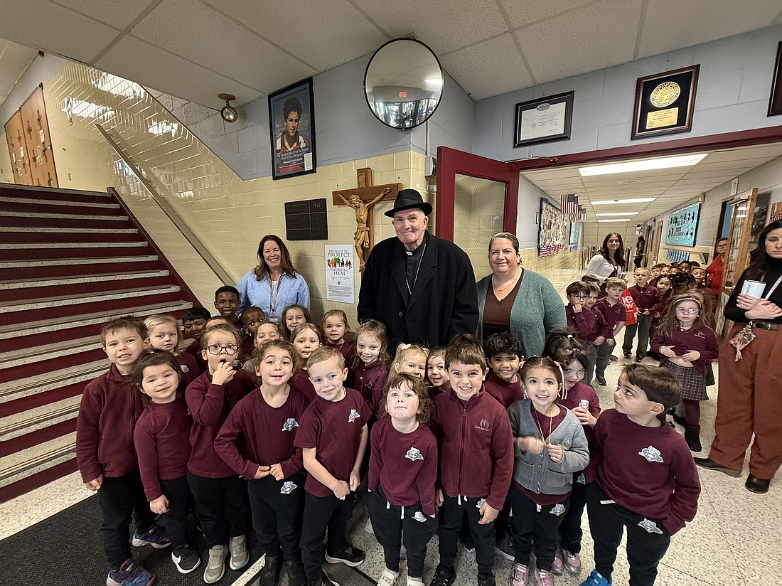 Many smiles are shown during the visit Bishop O'Connell made to St. Ann School, Lawrenceville, Jan. 28. Rose O'Connor photo