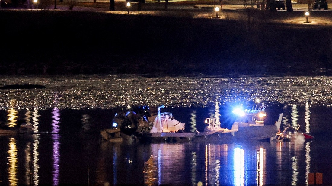 Emergency personnel and divers work Jan. 30, 2025, in a search-and-rescue mission on the Potomac River in Washington after American Eagle flight 5342 collided with a Black Hawk Army helicopter late Jan. 29 while on approach to Ronald Reagan Washington National Airport for landing and crashed into the river. Sixty passengers and four crew members were aboard the jet, and three soldiers were on the helicopter. (OSV News photo/Carlos Barria, Reuters)