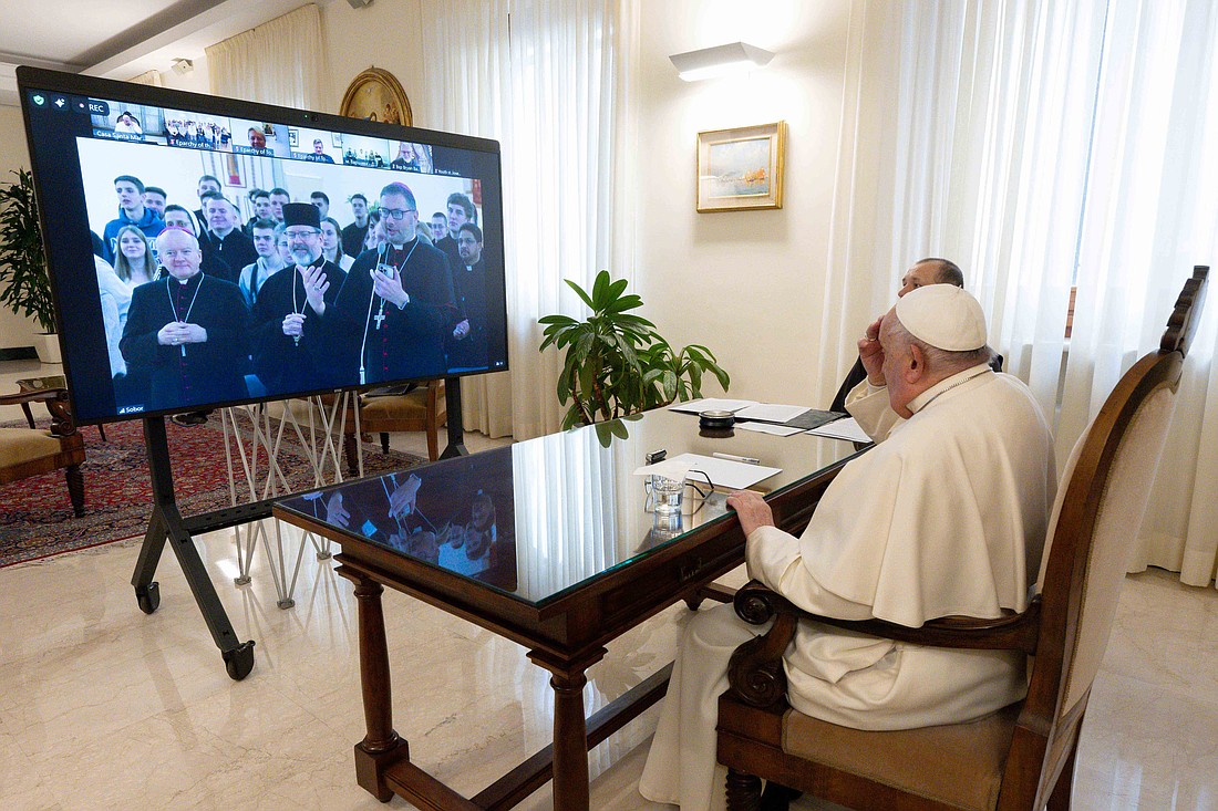 Pope Francis speaks with Major Archbishop Sviatoslav Shevchuk of Kyiv-Halych, head of the Ukrainian Greek Catholic Church, Auxiliary Bishop Jan Sobilo of Kharkiv-Zaporizhzhia, and Archbishop Visvaldas Kulbokas, nuncio to Ukraine, during a video call with young people gathered in the Ukrainian Greek Catholic Cathedral of the Resurrection in Kyiv Feb. 1, 2025. (CNS photo/Vatican Media)