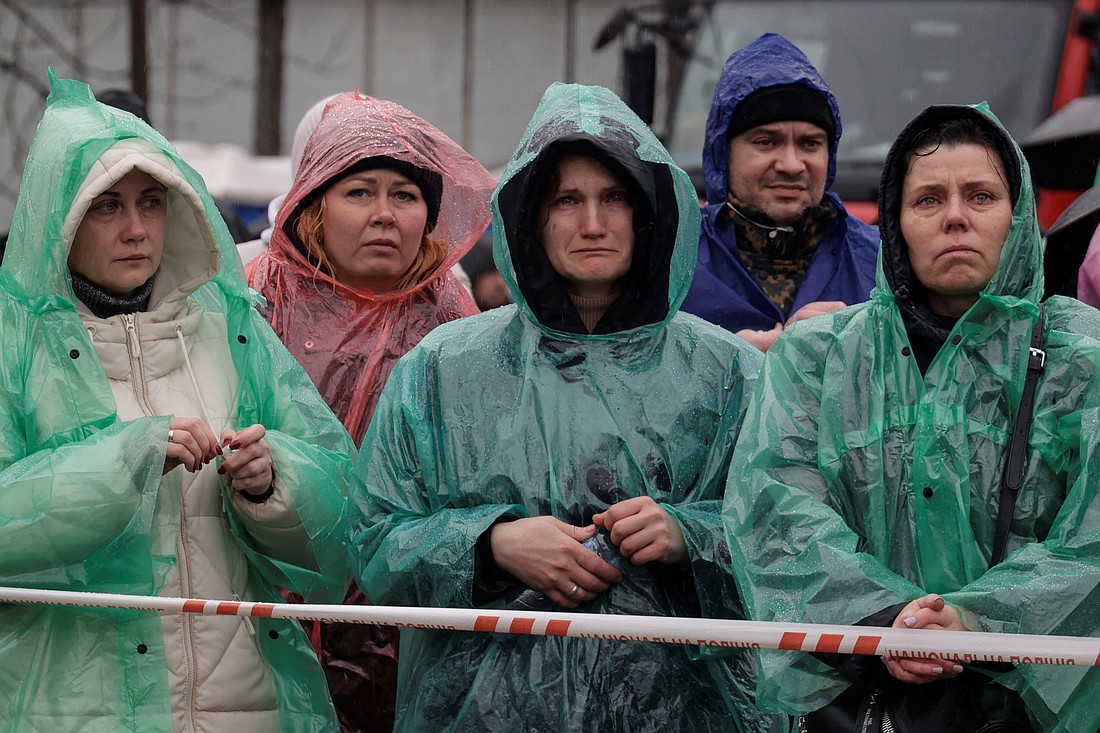 Residents react Feb. 1, 2025, at the site of an apartment building in Poltava, Ukraine, hit by a Russian missile strike amid Russia's attack on Ukraine. (OSV News photo/Sofiia Gatilova, Reuters)