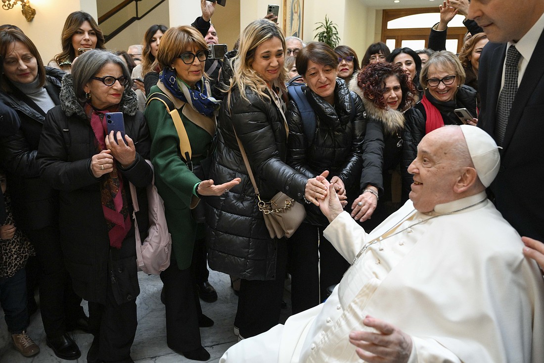 Pope Francis greets a group of obstetricians, gynecologists and other health care professionals from the southern Italian region of Calabria during an audience at the Vatican Feb. 6, 2025. (CNS photo/Vatican Media)