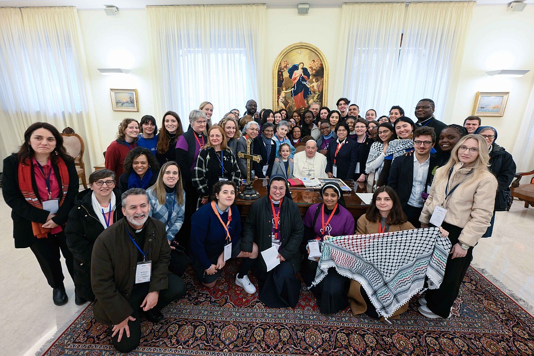 Pope Francis poses for a photo with members and supporters of Talitha Kum, an international network of religious working against human trafficking, in his residence at the Vatican Feb. 7, 2025. (CNS photo/Vatican Media)